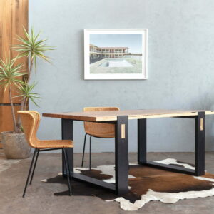 Timber dining table with black leg detail