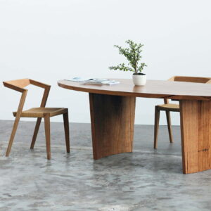 oval timber dining table with chairs