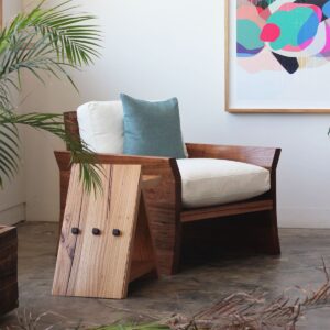 Timber armchair with palms and sidetable