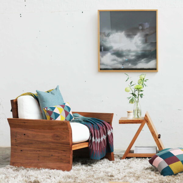 Side table with armchair with rug