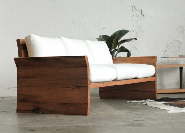 cream fabric sofa with timber legs