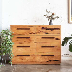 Timber tallboy with plants