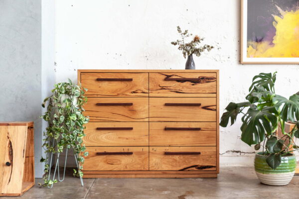 Timber tallboy with plants