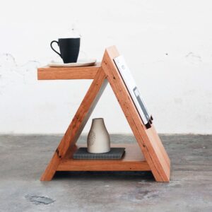 Timber side table with coffee cup and magazine