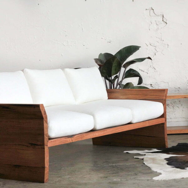 timber cream fabric sofa with plant