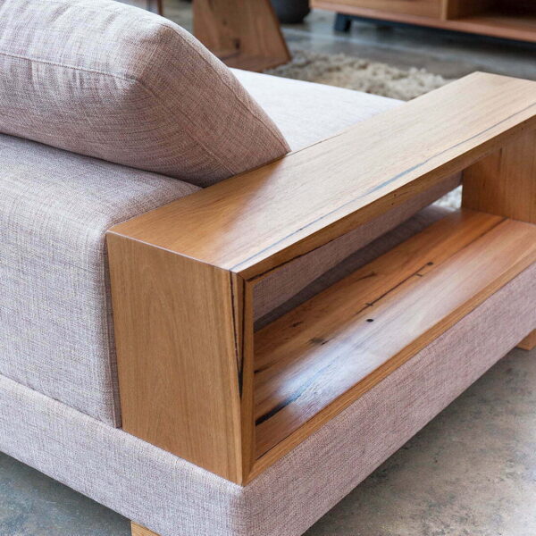 Three seater sofa with timber arm rest