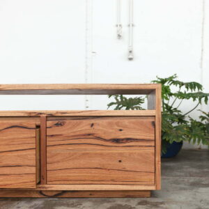 timber entertainment unit with plant