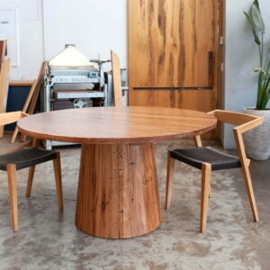 timber circular dining table with Urban loom dining chairs