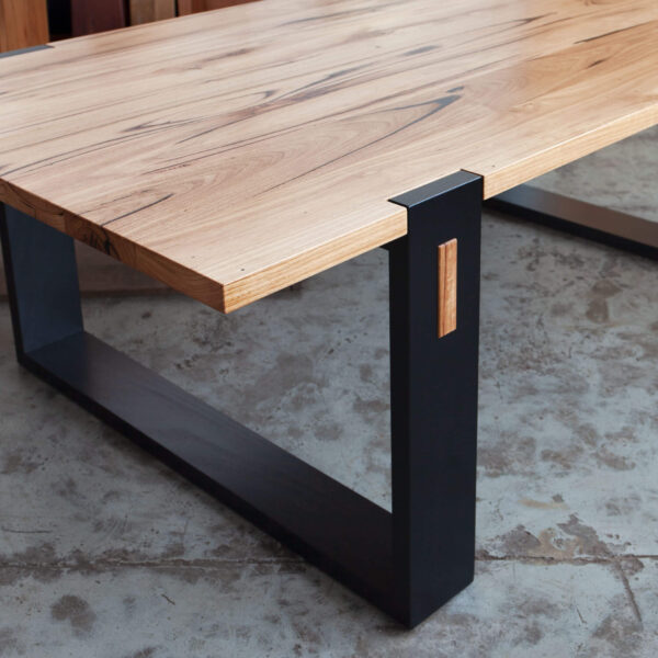 wooden black hoop leg dining table