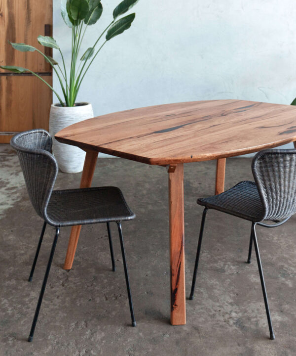 recycled timber oval dining table with dining chairs
