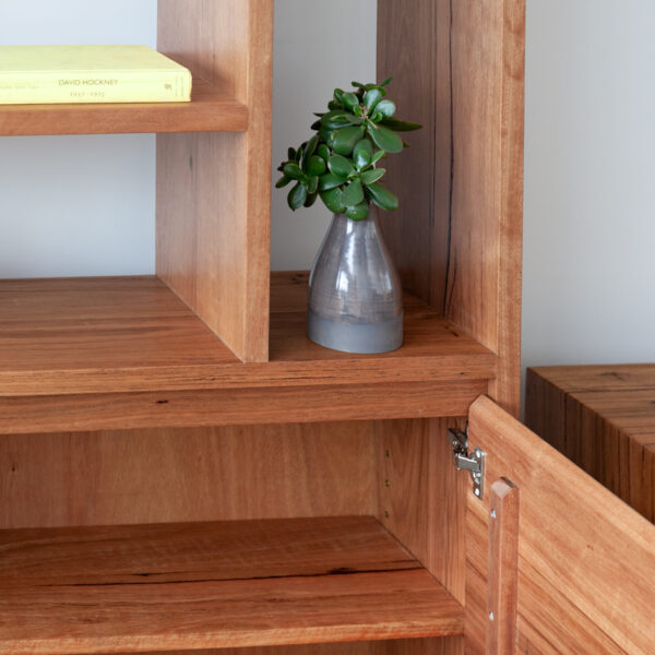timber shelving unit with drawer storage